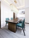 Luxurious dining room with dining table and kitchen