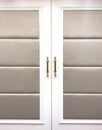 Luxurious door of hotel ballroom, gray and white color