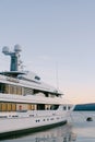 Luxurious double-deck yacht moored at the pier in Porto. Montenegro