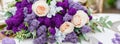 Luxurious flower bouquet on lilac covered laid table at wedding reception. Generative AI Royalty Free Stock Photo