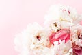 Luxurious fragrance bottle as chic perfume product on background of peony flowers, parfum ad and beauty branding