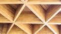 Luxurious geometric wooden triangles in construction. The concept of modern architecture, design and interior. Wood background.