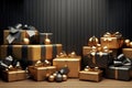 Luxurious gifts wrapped gold and black paper with ribbons and bows, on a wooden floor against dark wall Royalty Free Stock Photo