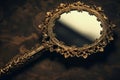 Luxurious gold filigree on a vintage hand mirror c Royalty Free Stock Photo