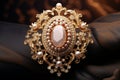 Luxurious gold pattern on an antique cameo brooch Royalty Free Stock Photo
