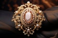 Luxurious gold pattern on an antique cameo brooch