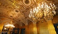 Luxurious golden chandeliers in State Hermitage Museum. Saint Petersburg, Russia.