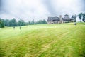 Luxurious golf course a cloudy day Royalty Free Stock Photo