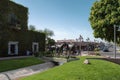 Luxurious green vegetaion and horse statues in Old Town Scottsdale, Arizona.