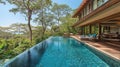 Luxurious infinity pool overlooking lush jungle Royalty Free Stock Photo