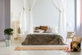 Bedroom with oversized bed blanket Royalty Free Stock Photo