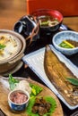 Luxurious Japanese meal set - broiled sole fish and boiled loaches with egg and burdock. Royalty Free Stock Photo