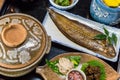 Luxurious Japanese meal set - broiled sole fish and boiled loaches with egg and burdock. Royalty Free Stock Photo