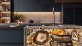 Luxurious kitchen interior with unique agate stone island and modern dark cabinets Royalty Free Stock Photo
