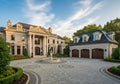 Luxurious mansion with classical architecture featuring tall columns and detailed pediments. The Royalty Free Stock Photo