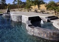 Luxurious mansion pool, spa and patio Royalty Free Stock Photo