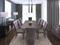 Luxurious modern dining room boasts a wood dining table illuminated by a pendant lights and surrounded by brown leather dining