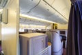 Luxurious and modern empty Interior in the airplane or passenger plane while parking view from rear