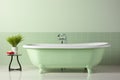 Luxurious modern light green bathroom interior with elegant bathtub and stylish tiled wall design Royalty Free Stock Photo