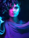 Luxurious mystical portrait, femme fatale in neon light.