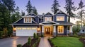 Luxurious new construction home exterior at sunset Royalty Free Stock Photo