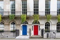Town house with red and blue door, London, UK