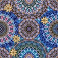 Luxurious ornament with mandalas and lotus flowers in vintage style. A quarter of the pattern for fabric, shawl, scarf, carpet. Royalty Free Stock Photo