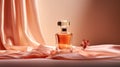 Luxurious Perfume Bottle On Silky Background With Cherry Blossoms Royalty Free Stock Photo