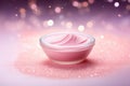 Luxurious pink sparkling body cream in a clear bowl with a radiant bokeh background. Royalty Free Stock Photo