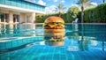 Luxurious Poolside Indulgence A Floating DoubleCheese Burger Awaits a Summer Getaway Royalty Free Stock Photo