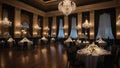 luxurious reception in a large ballroom with crystal chandeliers and set tables Royalty Free Stock Photo