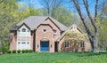 Luxurious Red Brick Home in Springtime Royalty Free Stock Photo