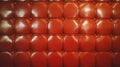 Luxurious red leather padded wall texture for interior design and decoration Royalty Free Stock Photo