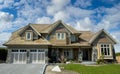 Luxurious Residence Home Stucco Exterior House Grand Dwelling Unique Design Cedar Shake Roofing Royalty Free Stock Photo