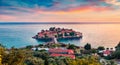 Luxurious resort and popular tourist destination Sveti Stefan town. Amazing sunset seascape of Adriatic sea, Montenegro, Europe. B