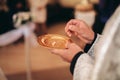 Luxurious rings in the church. Wedding ceremony Royalty Free Stock Photo