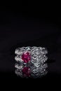 Luxurious ruby and diamond ring isolated on a black background Royalty Free Stock Photo