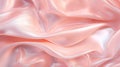 Luxurious satin fabric in soft pink hues gracefully drapes, creating a smooth, flowing texture. Royalty Free Stock Photo