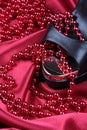 Luxurious satin with necklace and shoe Royalty Free Stock Photo