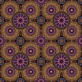 Luxurious seamless ornamental pattern with stylized golden lace, purple mandala flowers and blue quadrangular elements. Royalty Free Stock Photo