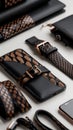 Luxurious snake pattern leather accessories with smartphone and watch display on white surface Royalty Free Stock Photo