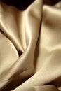 Luxurious soft gold fabric Royalty Free Stock Photo