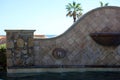 Luxurious spanish style pool with luxury water feature fountain at gorgeous villa with ocean view in Los Cabos Mexico Royalty Free Stock Photo