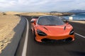 The luxurious, sporty Mclaren 720S when driving on a winding road