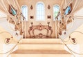 Luxurious staircase with marble steps and decorative and orname