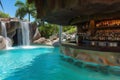 luxurious swimup bar with waterfalls in the background