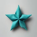 Luxurious Turquoise Origami Star On Gray Background