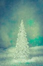 Luxurious vitreous christmas tree in snowy landscape