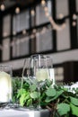 Luxurious white dining table set for a special occasion with candles and wine glasses Royalty Free Stock Photo