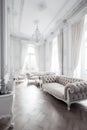 Luxurious white interior with white sofa and white furniture. Generative Ai